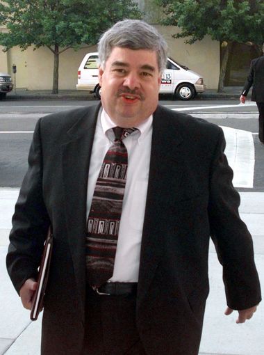 Robert Whiteside, director of reimbursement for single-market hospitals at Columbia/HCA Healthcare Corp.'s headquarters in Nashville, walks to the courthouse May 3, 1999