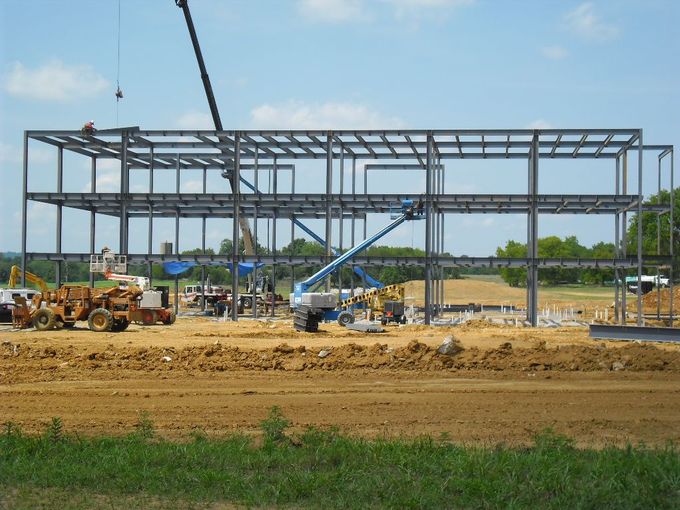 Crews erect a steel frame Aug. 22, 2012