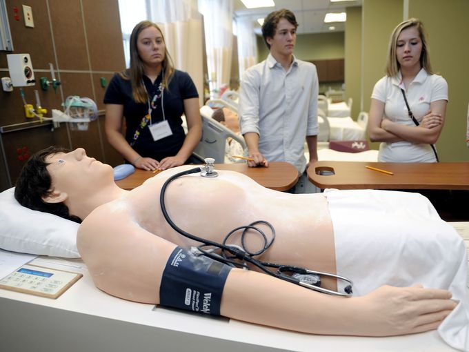 Harvey the mannequin is used to show high school students the different sounds of a heartbeat at the Health Science Simulation Center on June 13, 2013