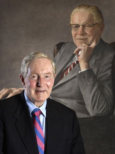 Frist Jr. poses with a painting of his father July 12, 2018