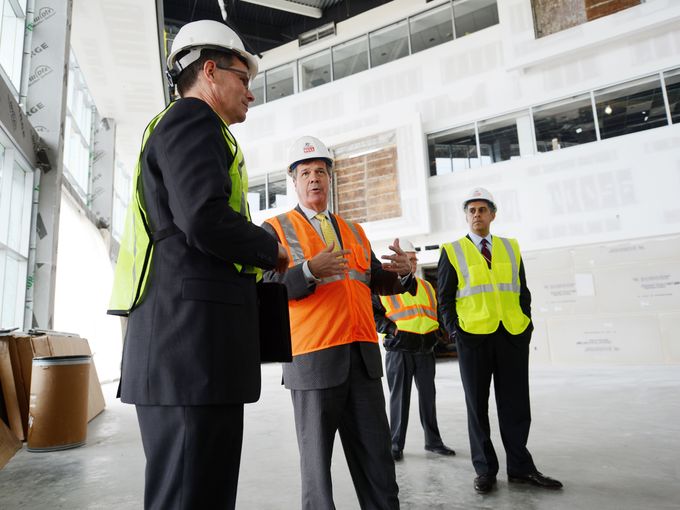 Nashville Mayor Karl Dean, center, tours the new Lentz Public Health Center with Dr. Bill Paul, Metro Public Health director, and Sam Hazen, HCA president of operations, Feb. 25, 2014